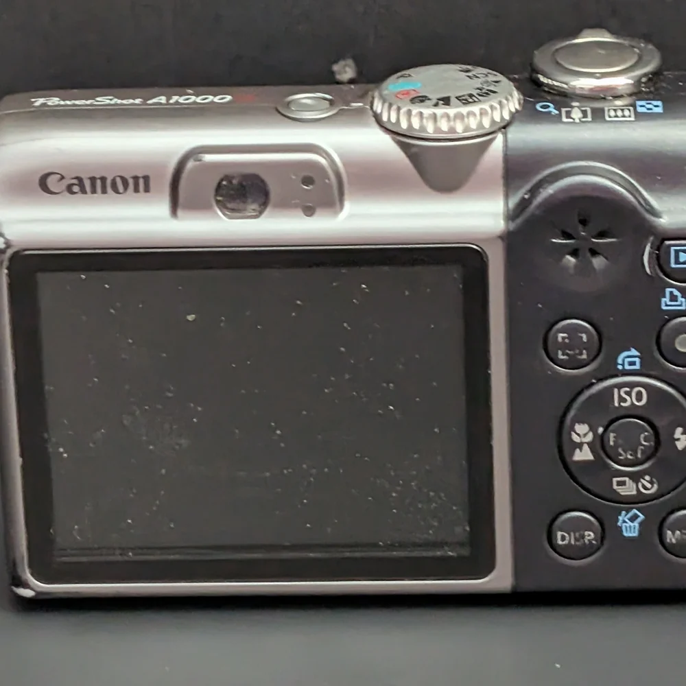 Canon PowerShot A1000 IS PC1309 10 MP optical zoom camera FOR PARTS ONLY 22026D4